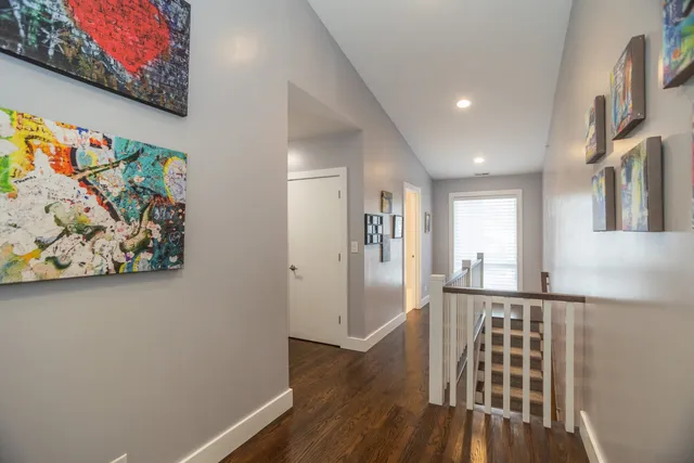 a view of entryway with wooden floor