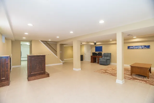 a room with furniture and a flat screen tv