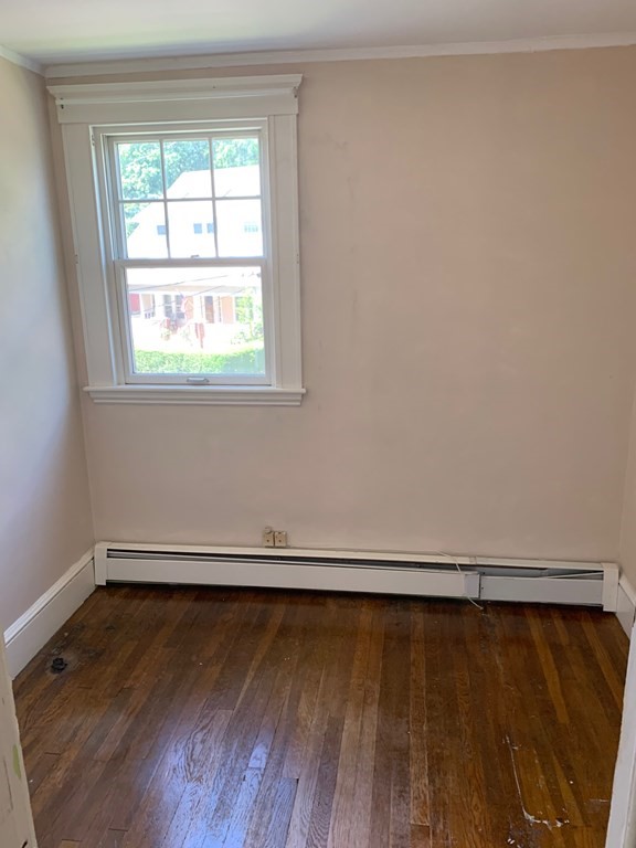 4 Martin Street, Unit 1 Marblehead, MA 01945 - Photo 11 of 13 a view of a room with wooden floor and a window