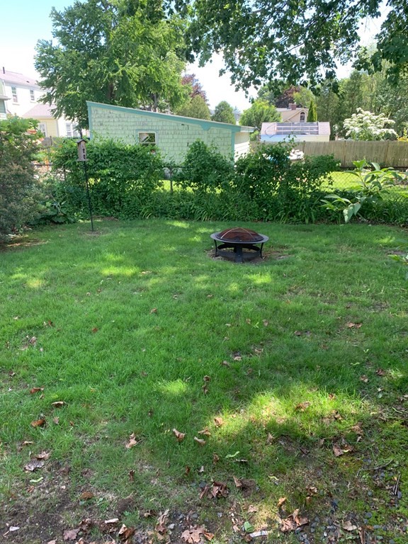 4 Martin Street, Unit 1 Marblehead, MA 01945 - Photo 12 of 13 a view of a garden with a lake