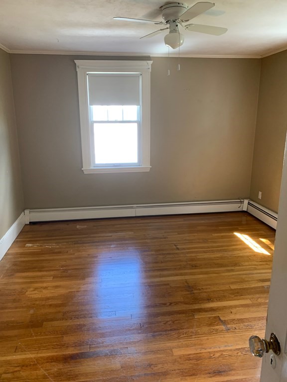 4 Martin Street, Unit 1 Marblehead, MA 01945 - Photo 9 of 13 a view of room with window and ceiling fan