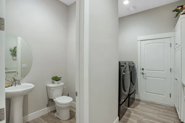 a bathroom with a toilet and a sink
