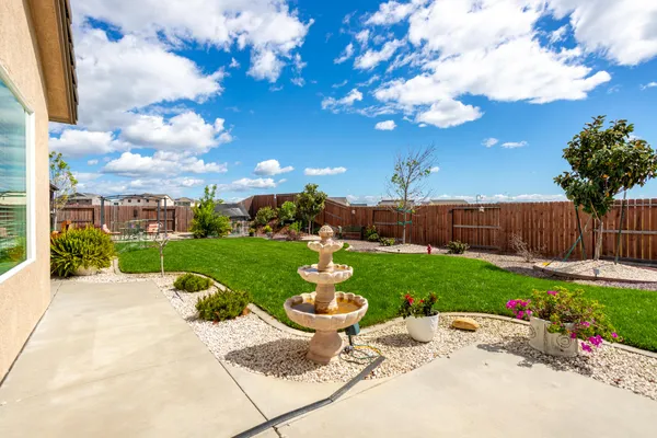 a garden view with a seating space