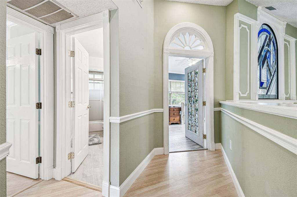 7115 Hummingbird Lane New Port Richey, FL 34655 - Photo 40 of 75 a view of a hallway with entryway front door