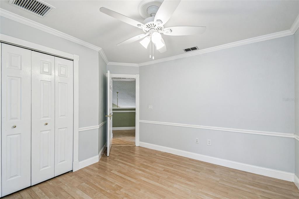 7115 Hummingbird Lane New Port Richey, FL 34655 - Photo 47 of 75 wooden floor in an empty room with a window