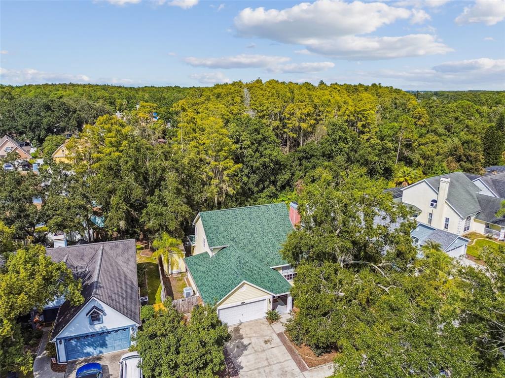 7115 Hummingbird Lane New Port Richey, FL 34655 - Photo 63 of 75 an aerial view of a house with a yard