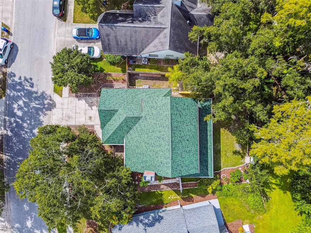 7115 Hummingbird Lane New Port Richey, FL 34655 - Photo 72 of 75 an aerial view of a house with a yard