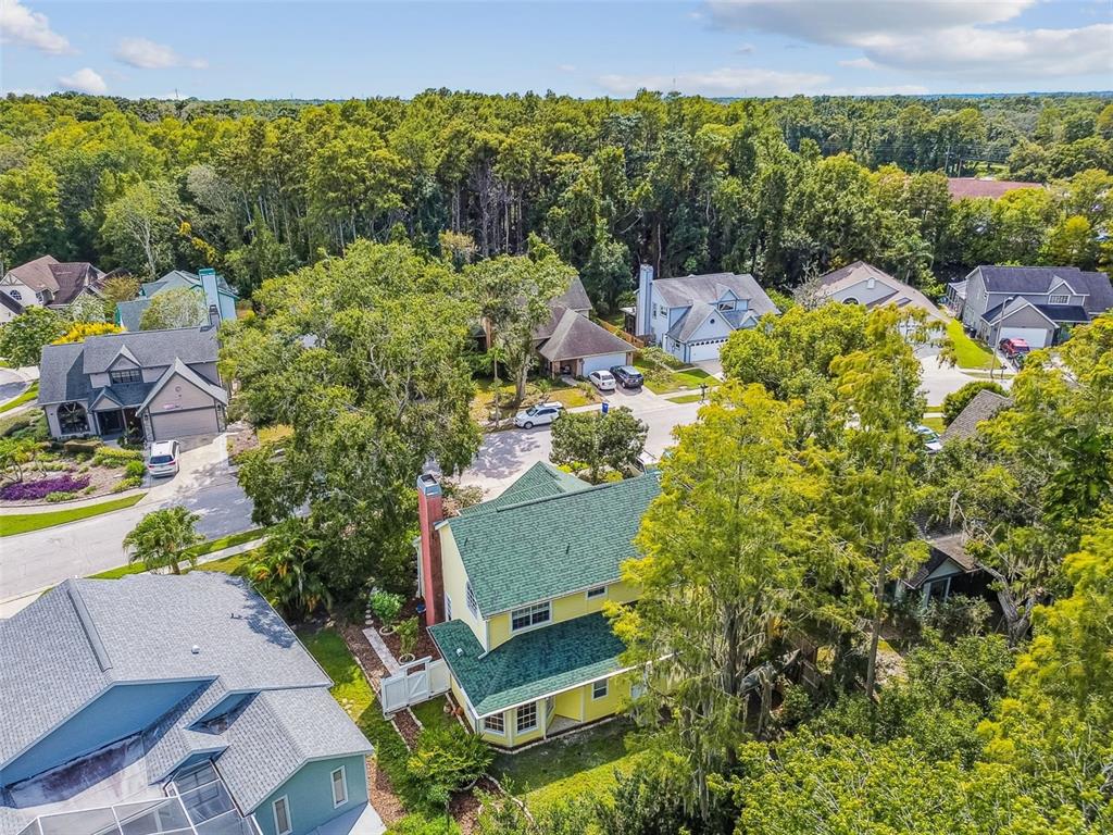 7115 Hummingbird Lane New Port Richey, FL 34655 - Photo 74 of 75 an aerial view of a house with a yard