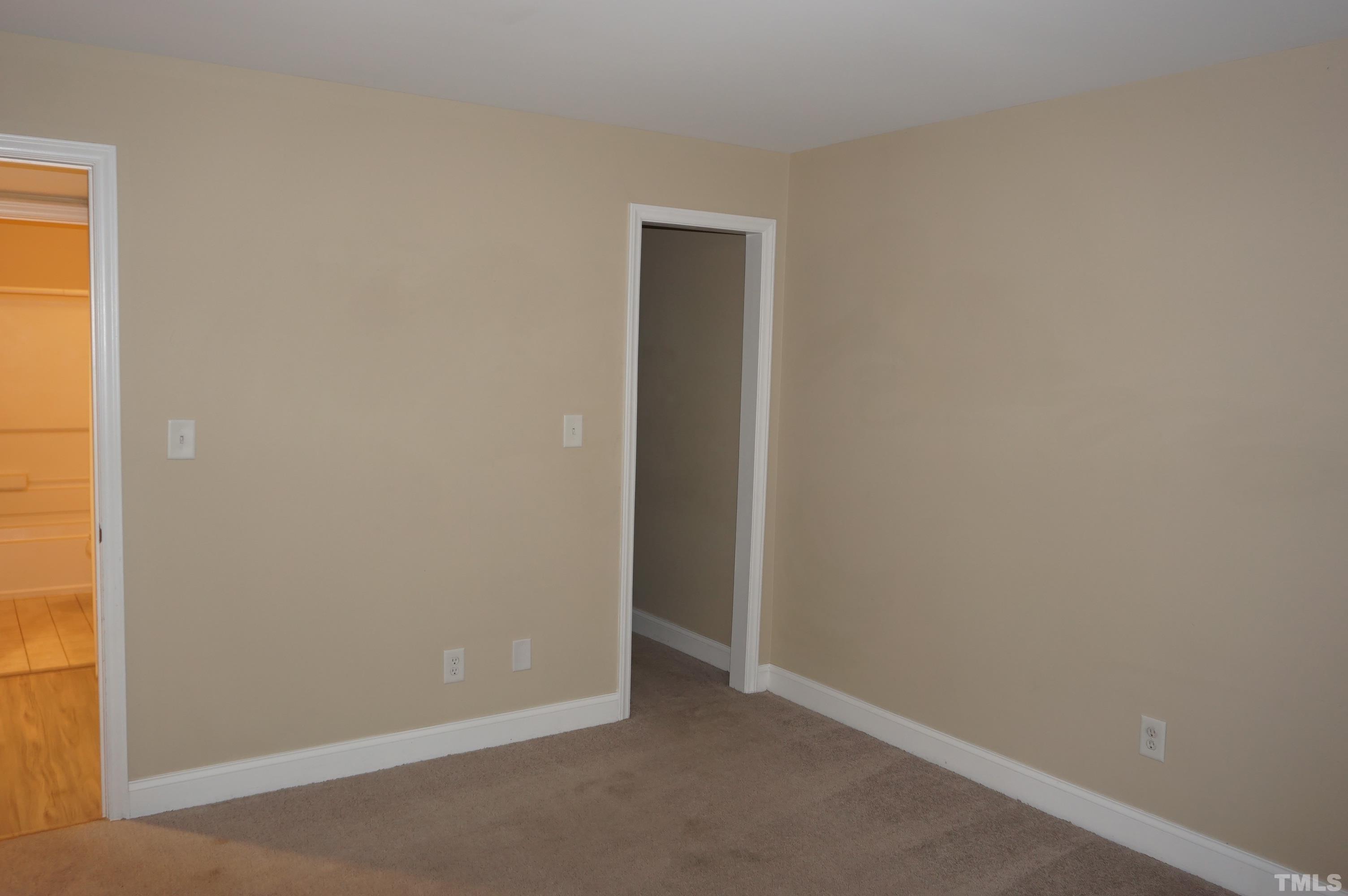 4505 Edwards Mill Road, Unit F Raleigh, NC 27612 - Photo 18 of 34 a view of an empty room