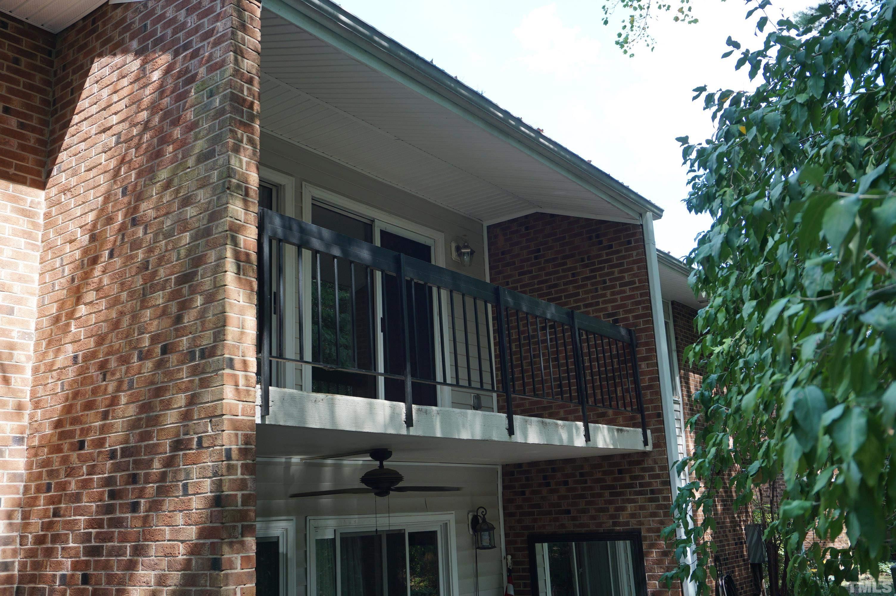 4505 Edwards Mill Road, Unit F Raleigh, NC 27612 - Photo 3 of 34 a view of a house with a window