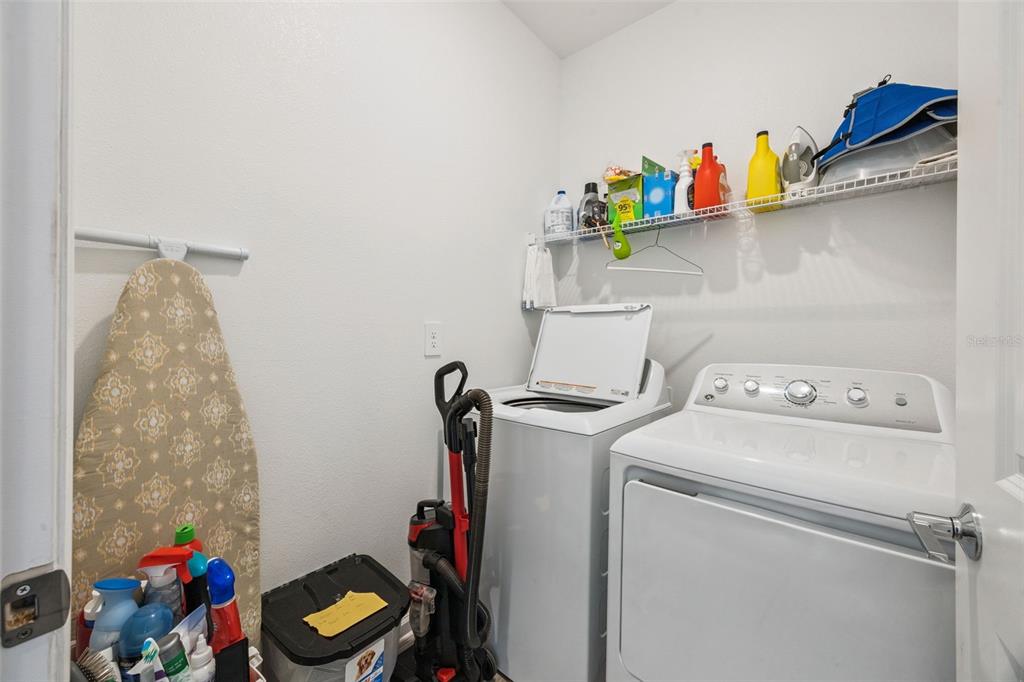 2714 Slash Way St. Cloud, FL 34771 - Photo 27 of 50 a utility room with dryer and washer