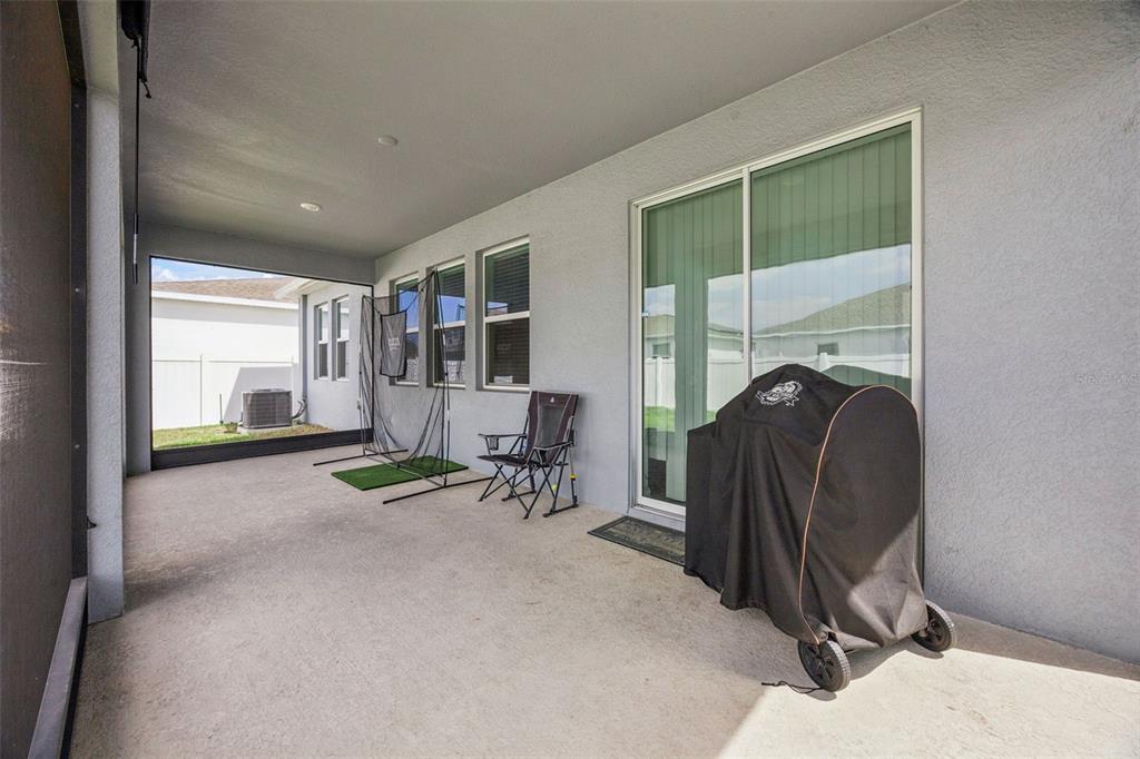 2714 Slash Way St. Cloud, FL 34771 - Photo 30 of 50 a view of a room with gym equipment and a window