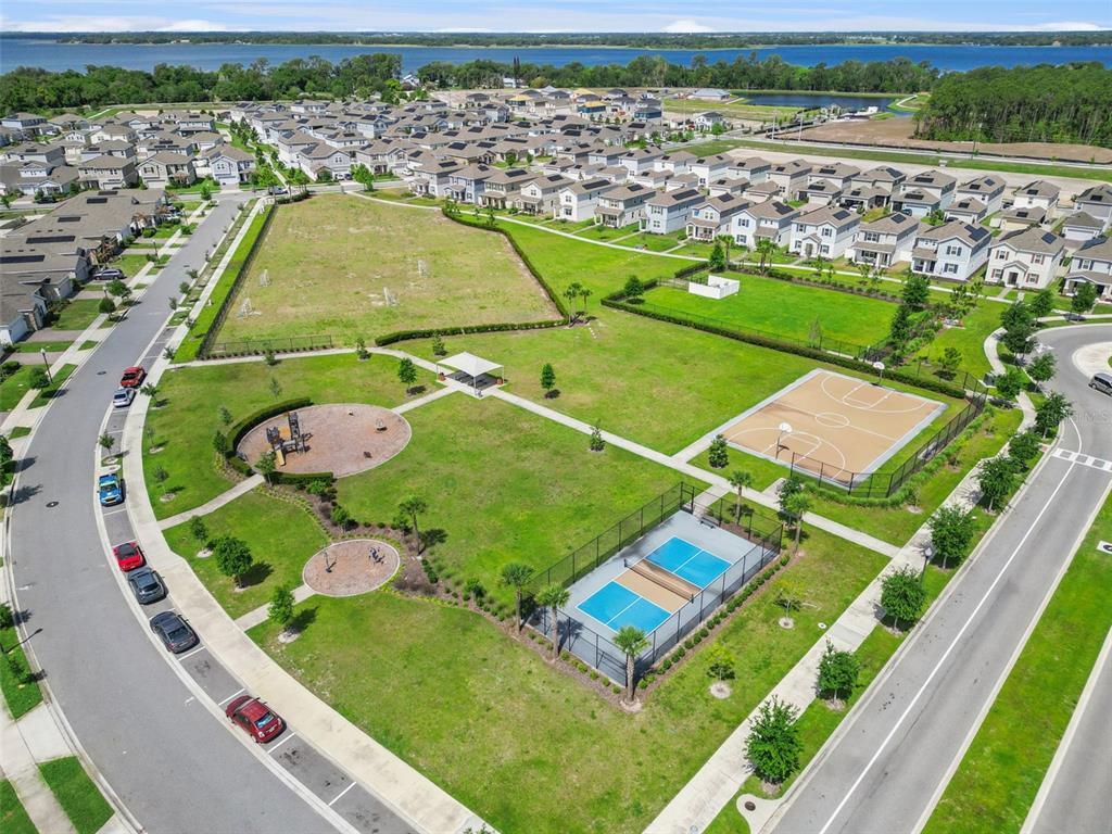 2714 Slash Way St. Cloud, FL 34771 - Photo 41 of 50 an aerial view of a pool a yard with lawn chairs