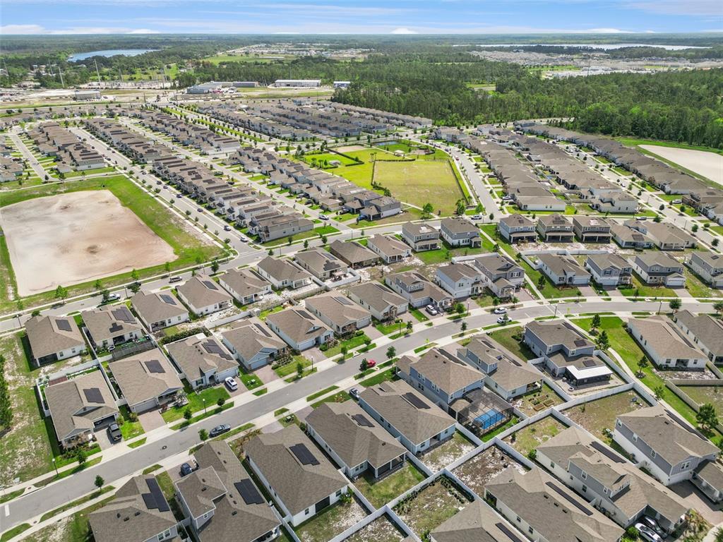 2714 Slash Way St. Cloud, FL 34771 - Photo 43 of 50 an aerial view of residential houses with outdoor space