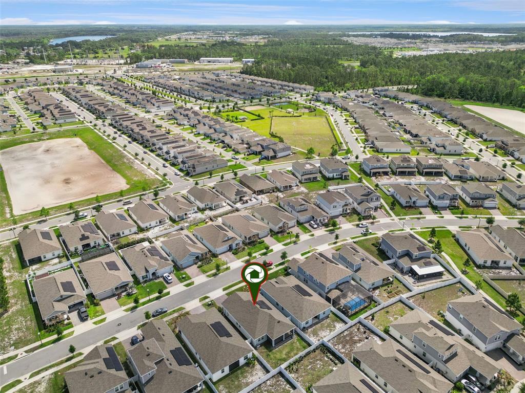 2714 Slash Way St. Cloud, FL 34771 - Photo 44 of 50 an aerial view of residential houses with outdoor space