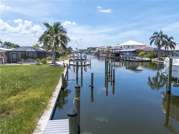 a view of swimming pool with chairs