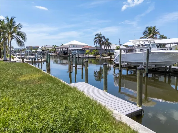 a swimming pool view with a lake view