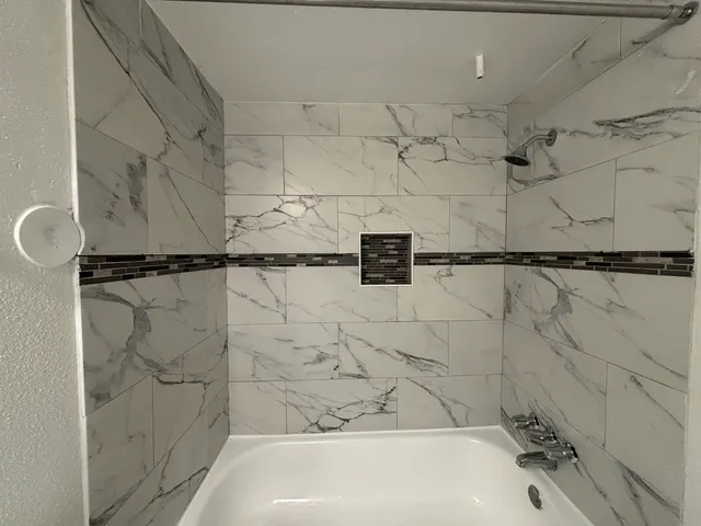 a bathroom with a bathtub