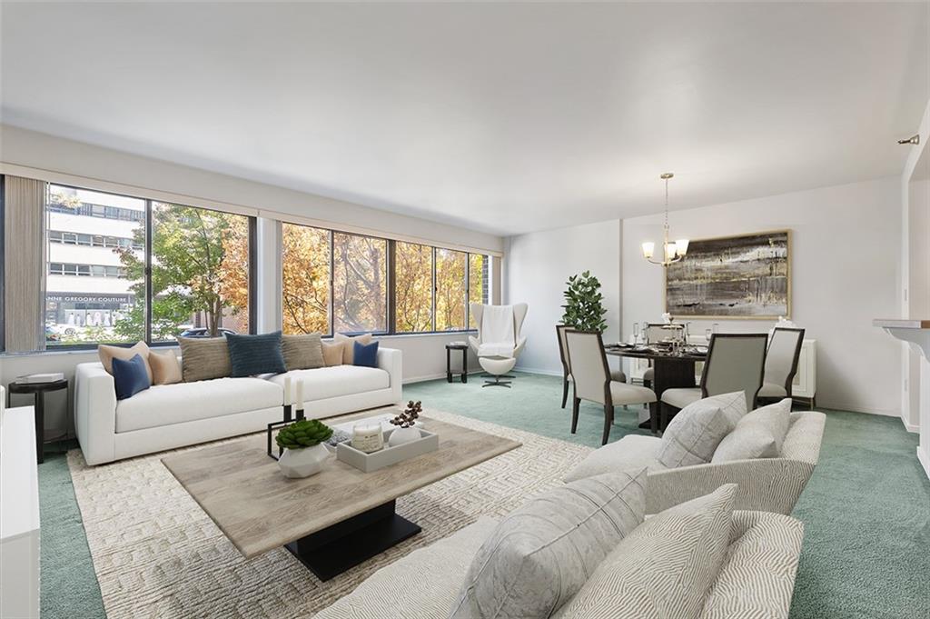 750 Washington Road, Unit 610 Pittsburgh, PA 15228 - Photo 12 of 25 a living room with furniture and a large window