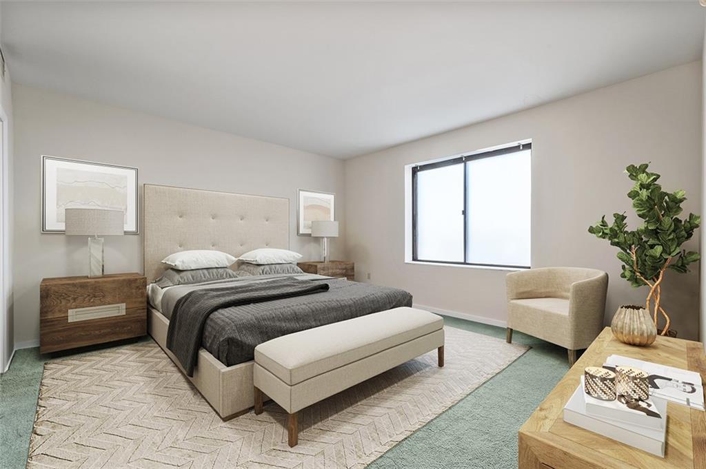 750 Washington Road, Unit 610 Pittsburgh, PA 15228 - Photo 16 of 25 a bedroom with a bed and a couch