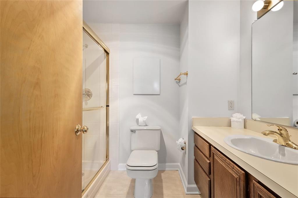 750 Washington Road, Unit 610 Pittsburgh, PA 15228 - Photo 18 of 25 a bathroom with a sink toilet and shower