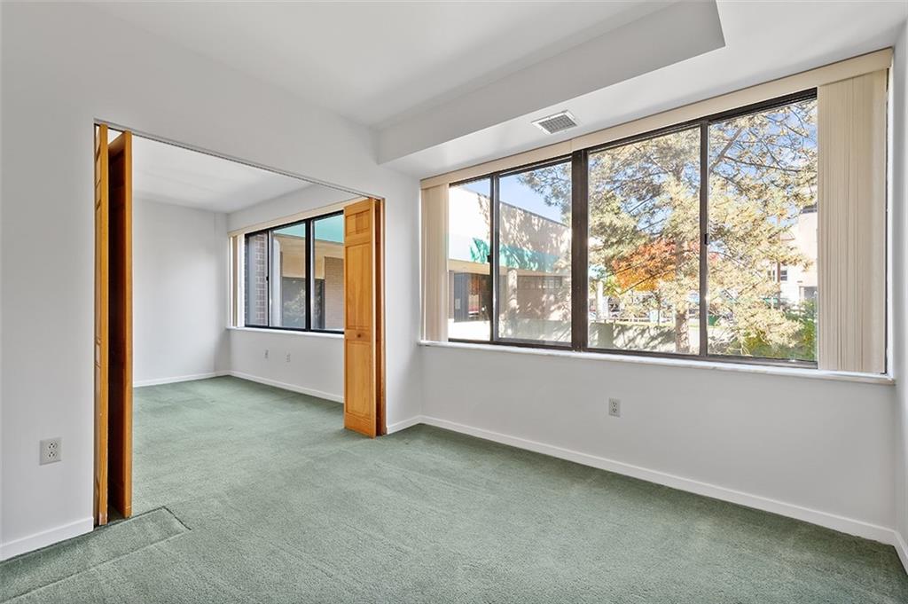 750 Washington Road, Unit 610 Pittsburgh, PA 15228 - Photo 24 of 25 an empty room with windows and closet