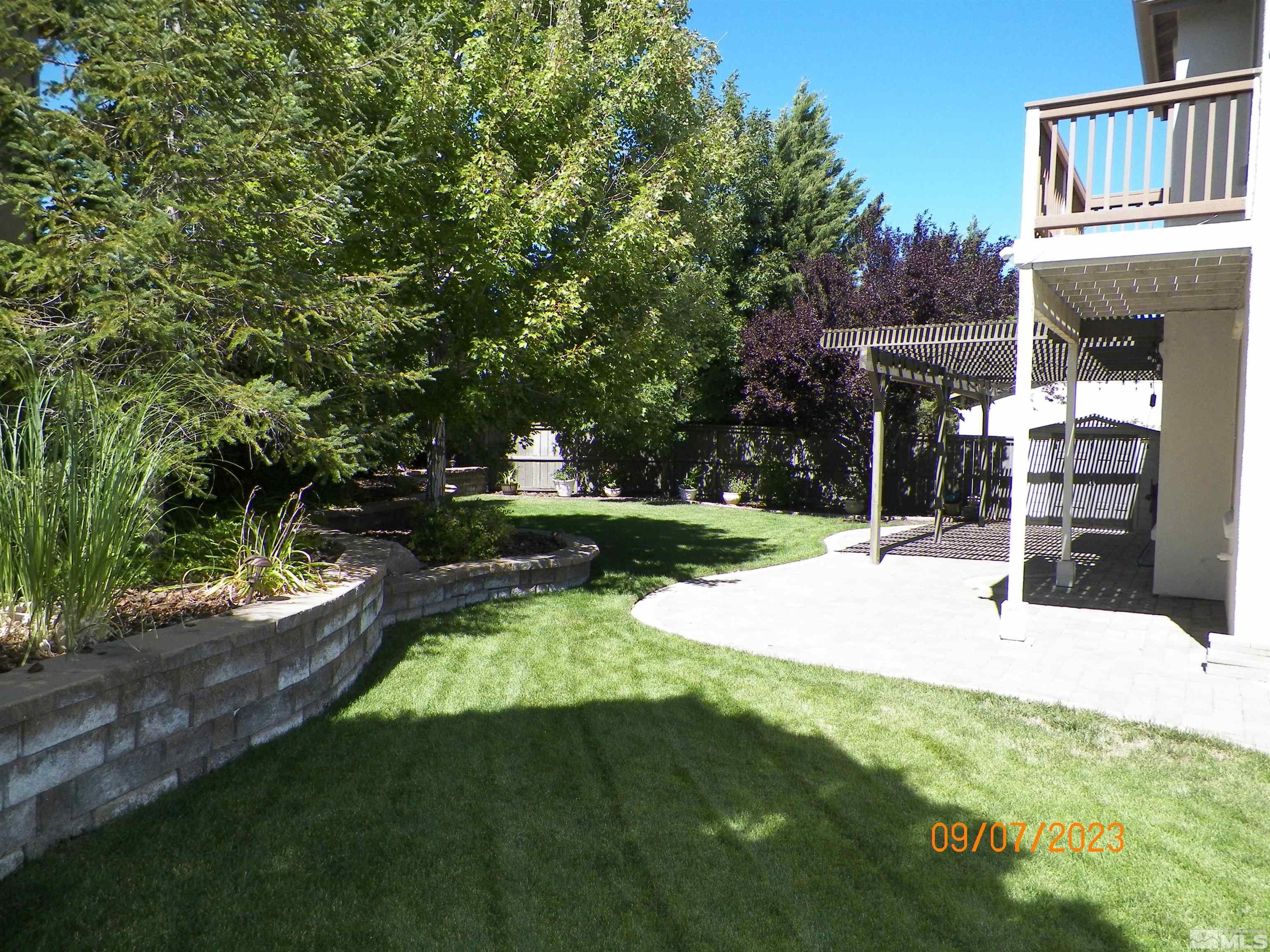 14031 Welsh Mountain Court Reno, NV 89521 - Photo 35 of 40 a view of back yard of the house