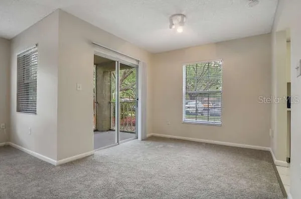 an empty room with windows