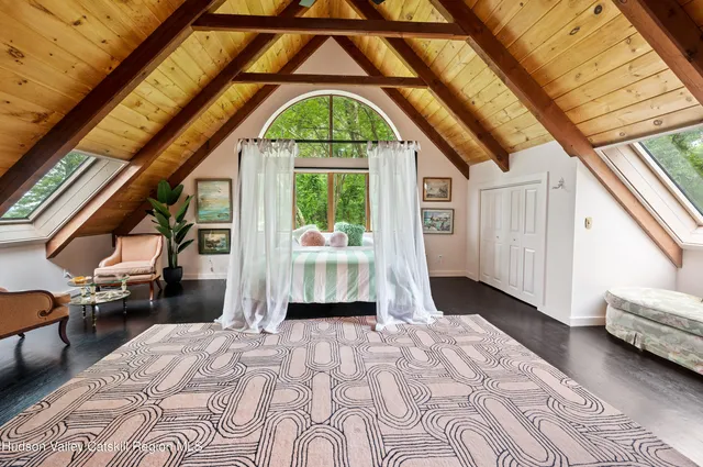 a view of livingroom with furniture and floor to ceiling window