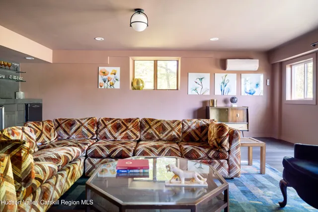 a living room with a couch and a table