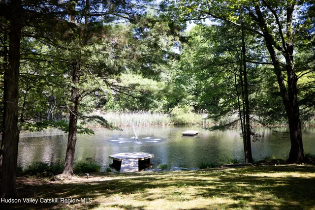 a view of a lake from a yard