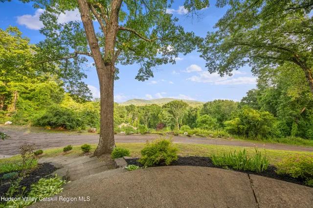 a view of a road with an ocean view