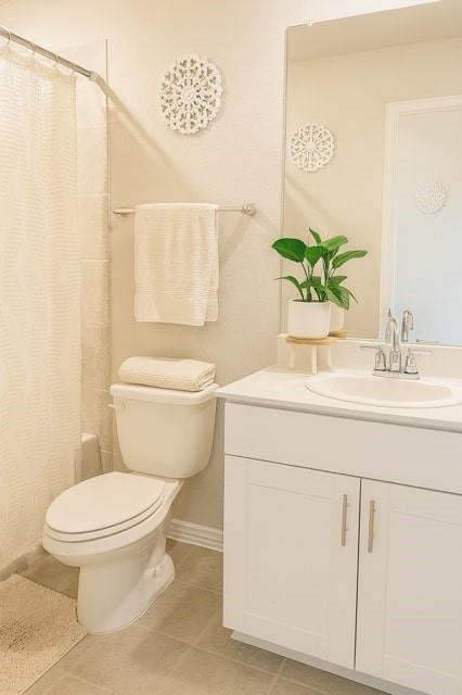 495 Sweet Lane Princeton, TX 75407 - Photo 16 of 20 a bathroom with a sink a toilet and a mirror