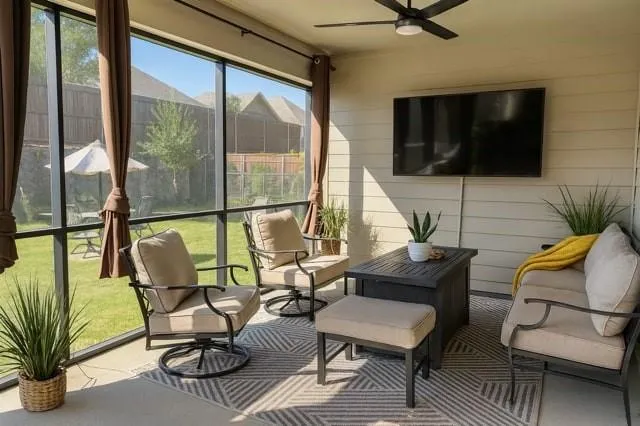a living room with furniture and a flat screen tv