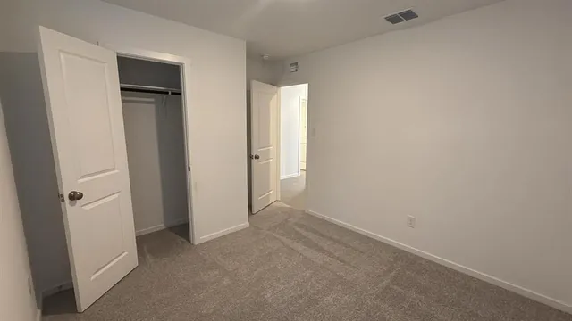 an empty room with closet