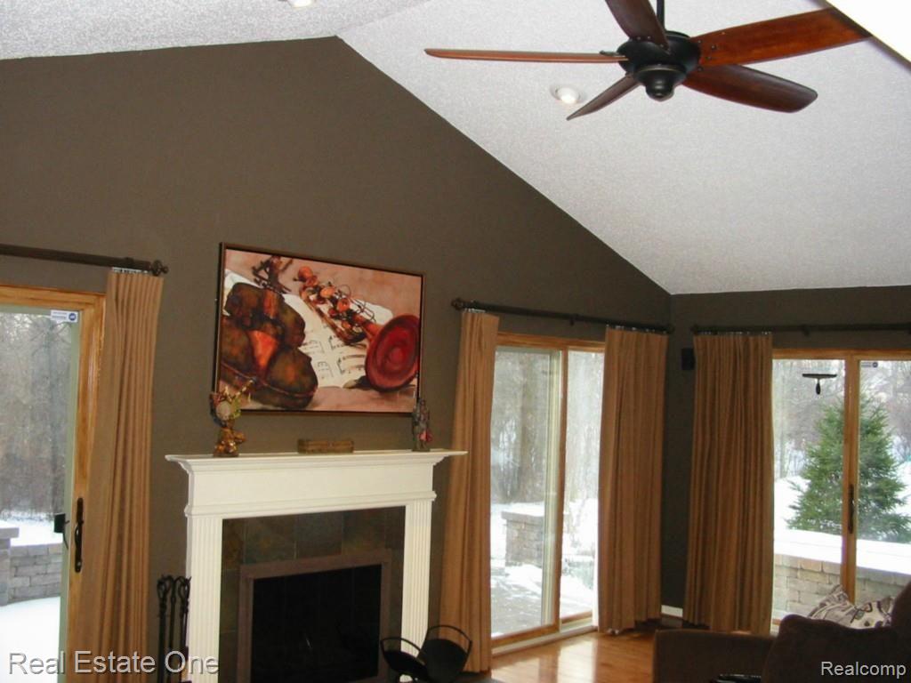 1600 Dunston Road Canton, MI 48188 - Photo 6 of 39 Great Room Features Vaulted Ceiling and Three Door walls that access to Sand Stone Patio & Jacuzzi.