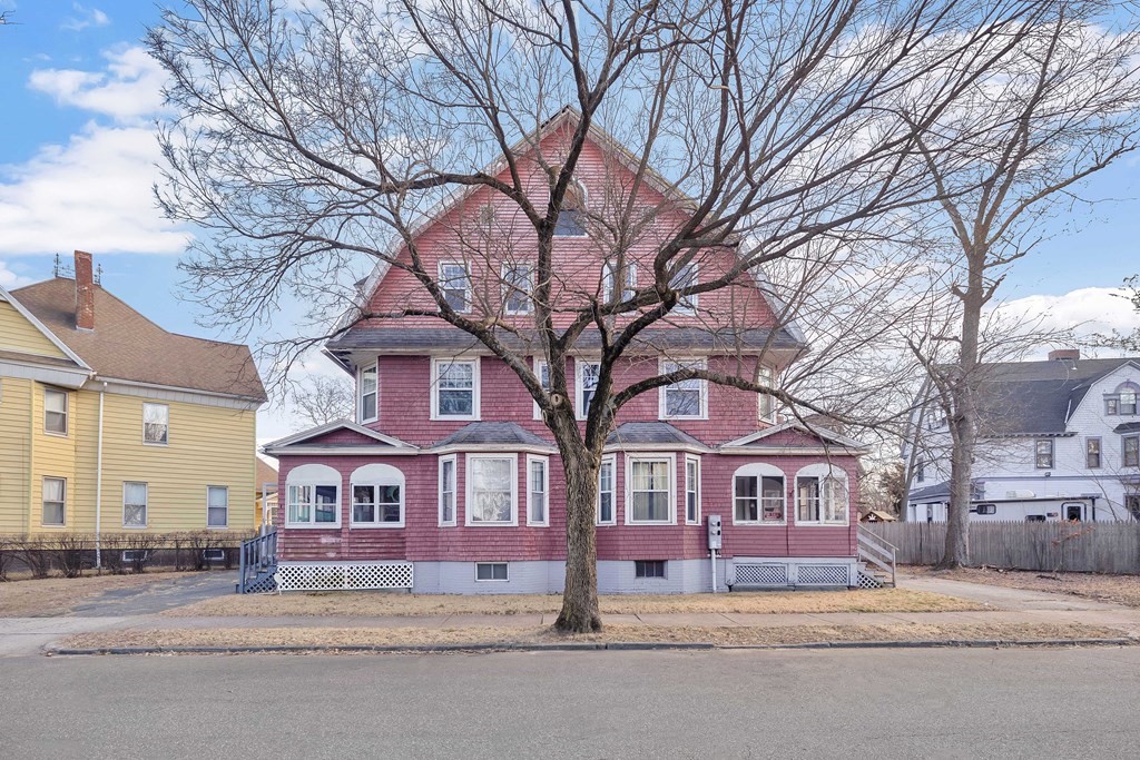 7-9 Cornell Street Springfield, MA 01109 - Photo 1 of 40 a front view of residential houses with yard and trees