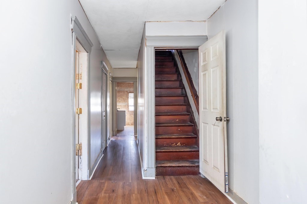 7-9 Cornell Street Springfield, MA 01109 - Photo 27 of 40 a view of a hallway with wooden floor and entryway