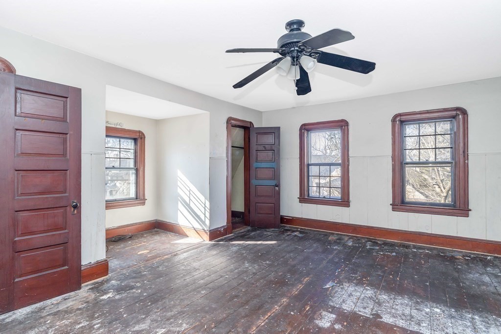 7-9 Cornell Street Springfield, MA 01109 - Photo 32 of 40 a view of an empty room with window and cabinet