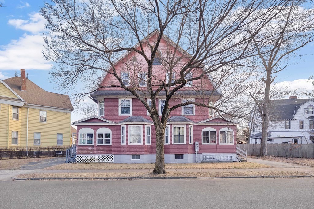 7-9 Cornell Street Springfield, MA 01109 - Photo 40 of 40 a front view of residential houses with yard and trees