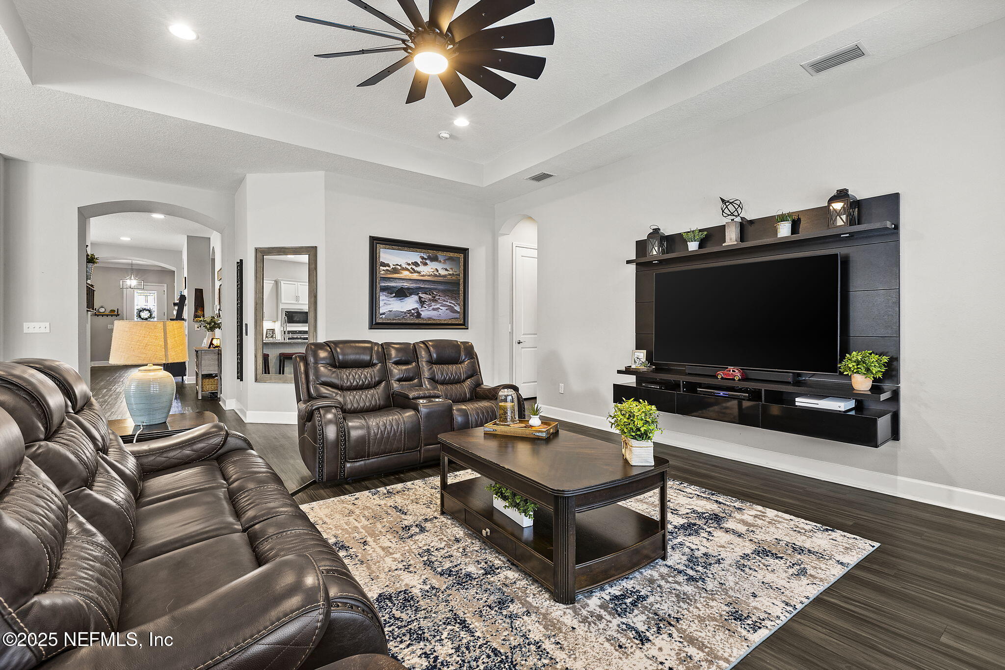 45 Manor Lane St. Johns, FL 32259 - Photo 20 of 47 a living room with furniture and a flat screen tv
