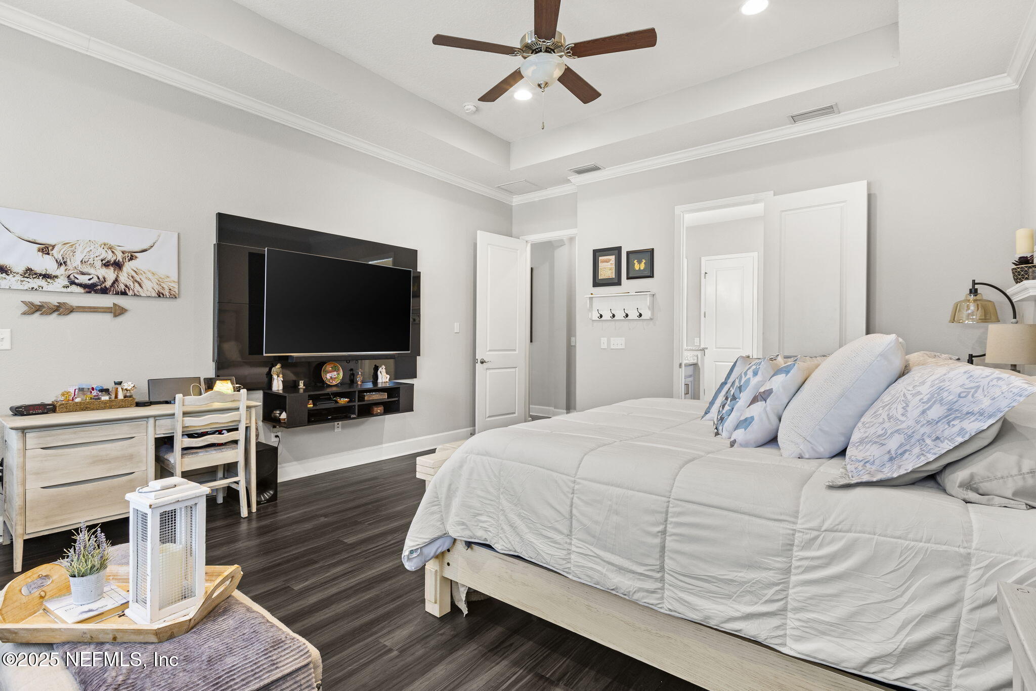 45 Manor Lane St. Johns, FL 32259 - Photo 24 of 47 a bedroom with a bed and a flat screen tv