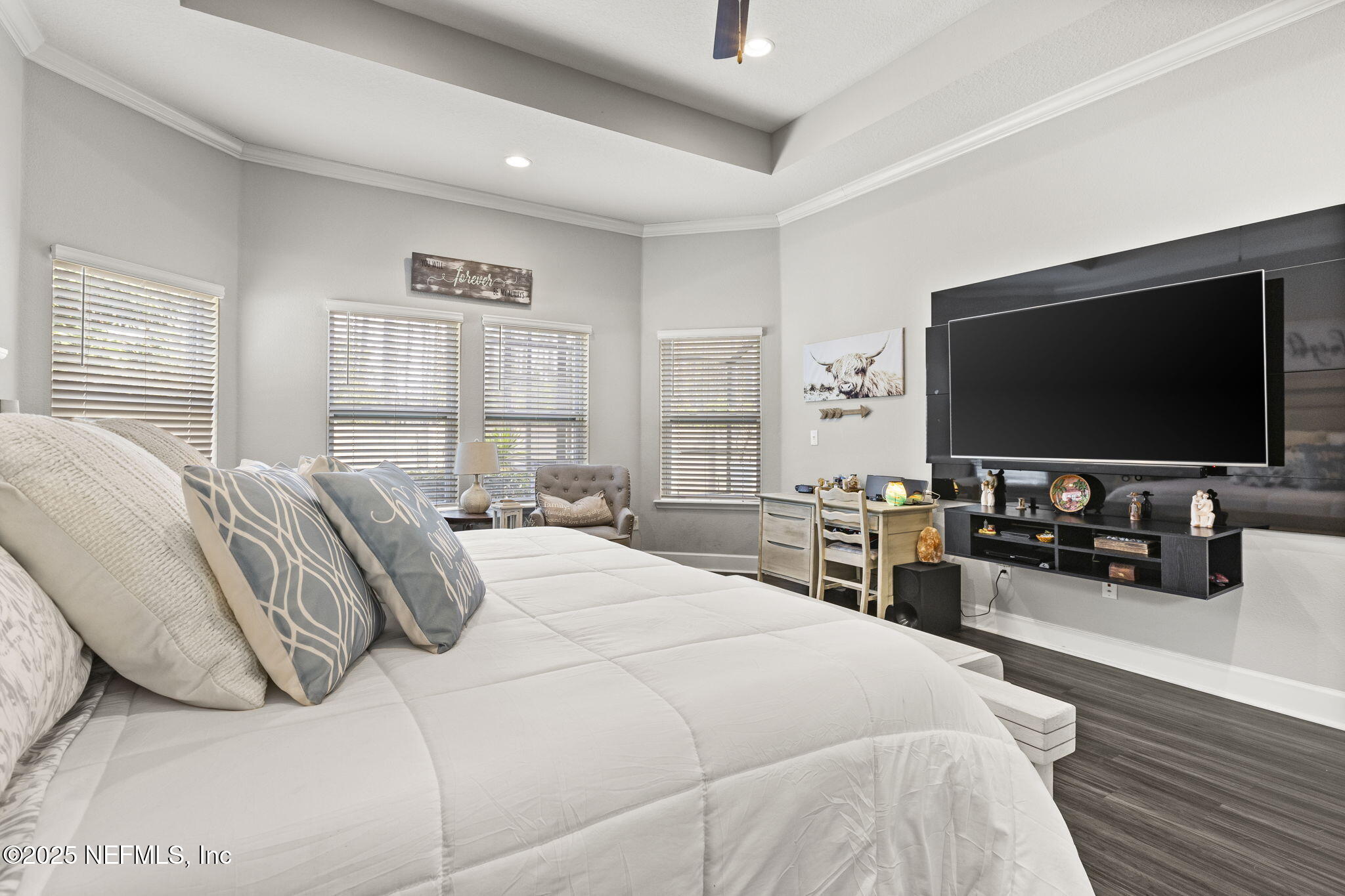 45 Manor Lane St. Johns, FL 32259 - Photo 25 of 47 a bedroom with a bed and a flat screen tv