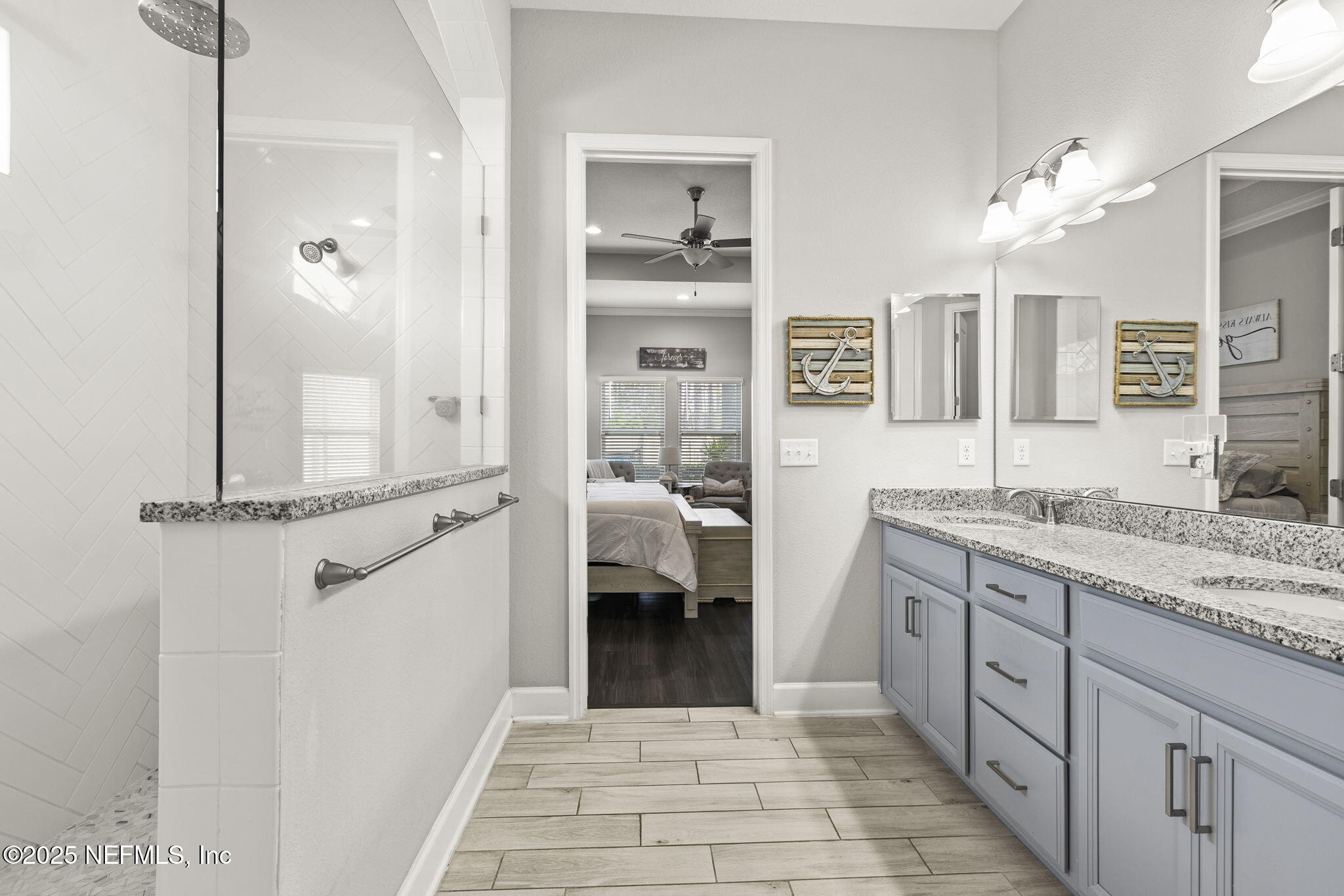 45 Manor Lane St. Johns, FL 32259 - Photo 27 of 47 a bathroom with a sink a vanity and a mirror