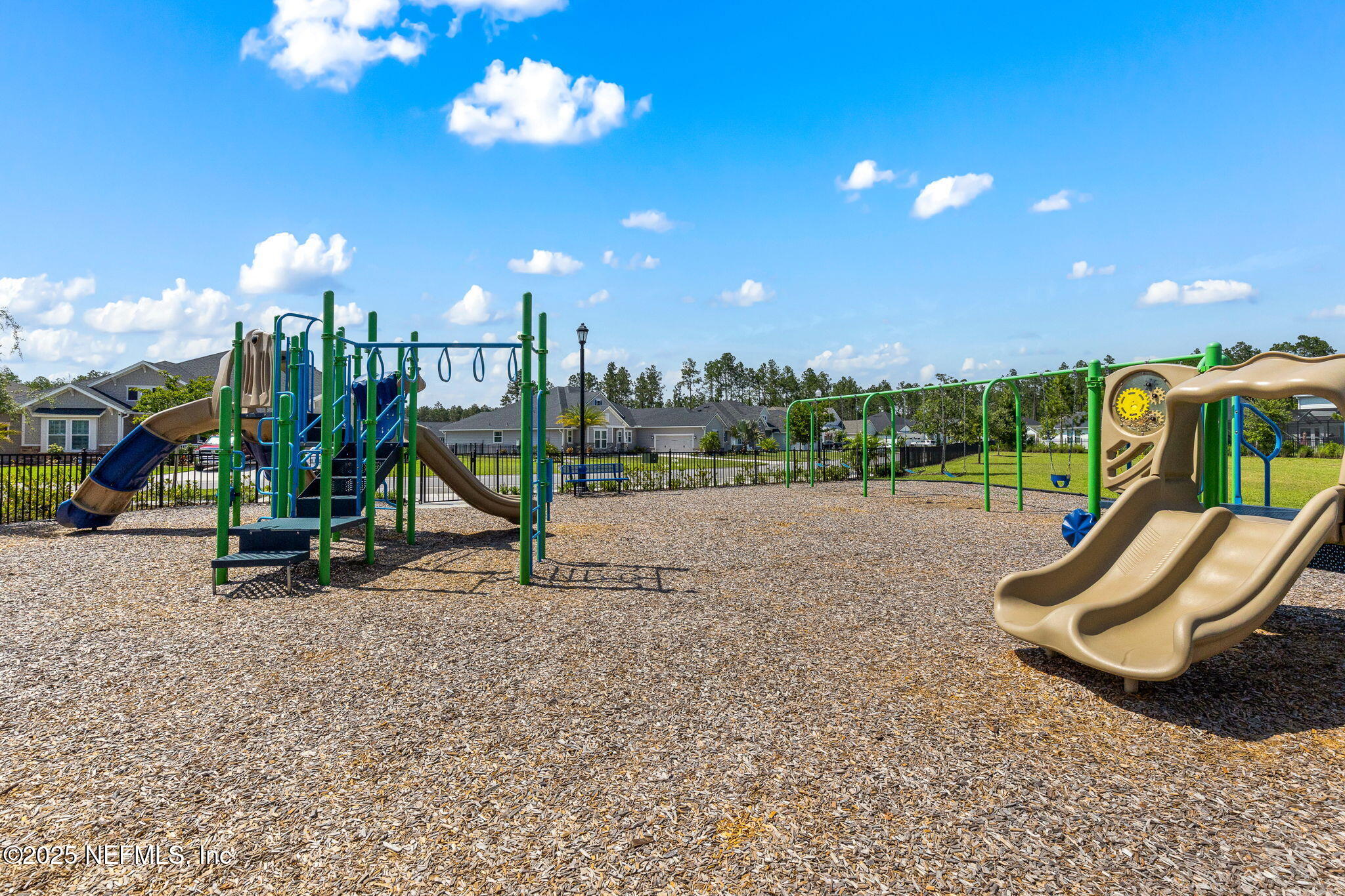 45 Manor Lane St. Johns, FL 32259 - Photo 37 of 47 a view of a park with swings and slides