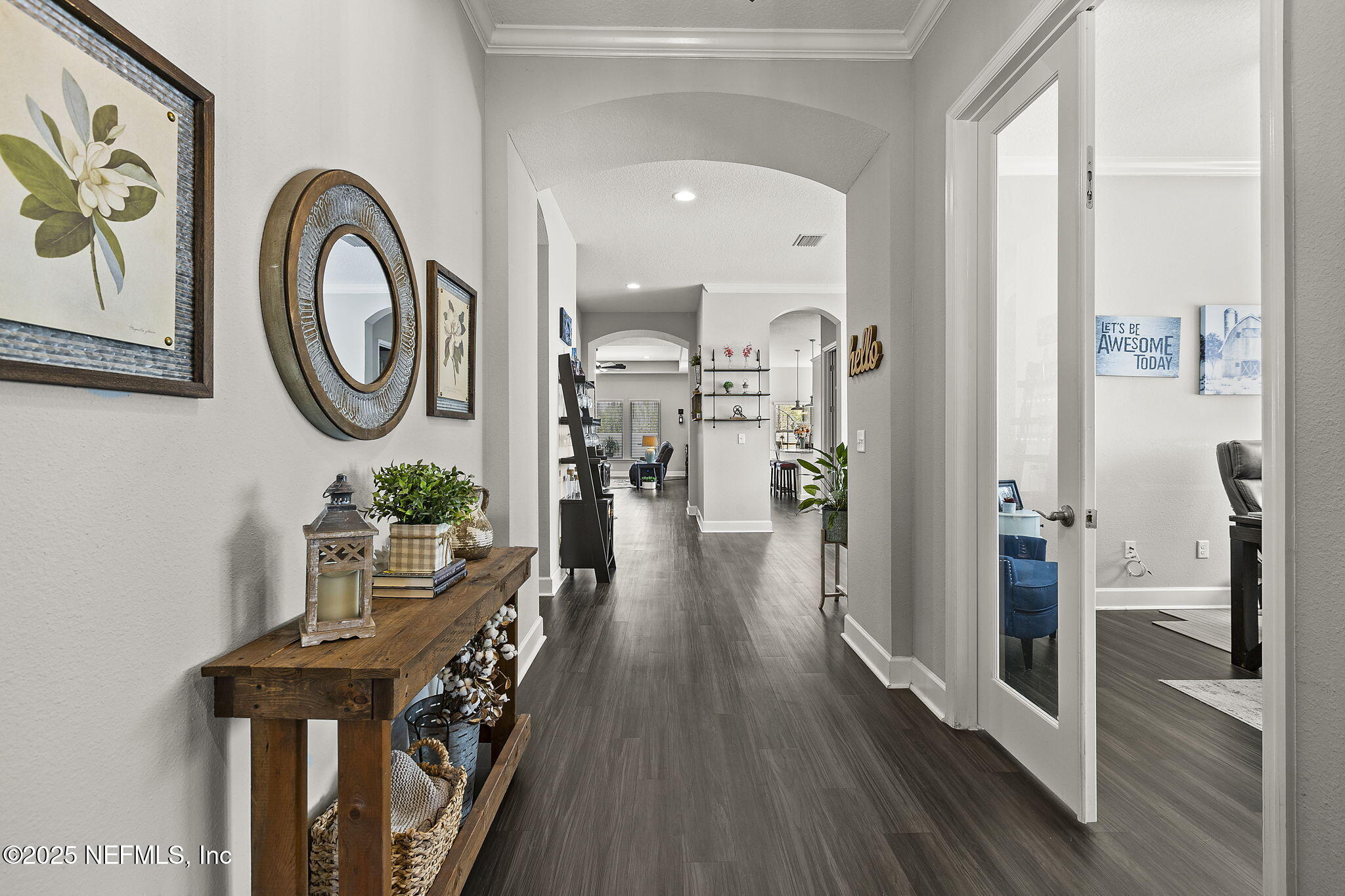 45 Manor Lane St. Johns, FL 32259 - Photo 6 of 47 a view of a hallway with wooden floor and entryway