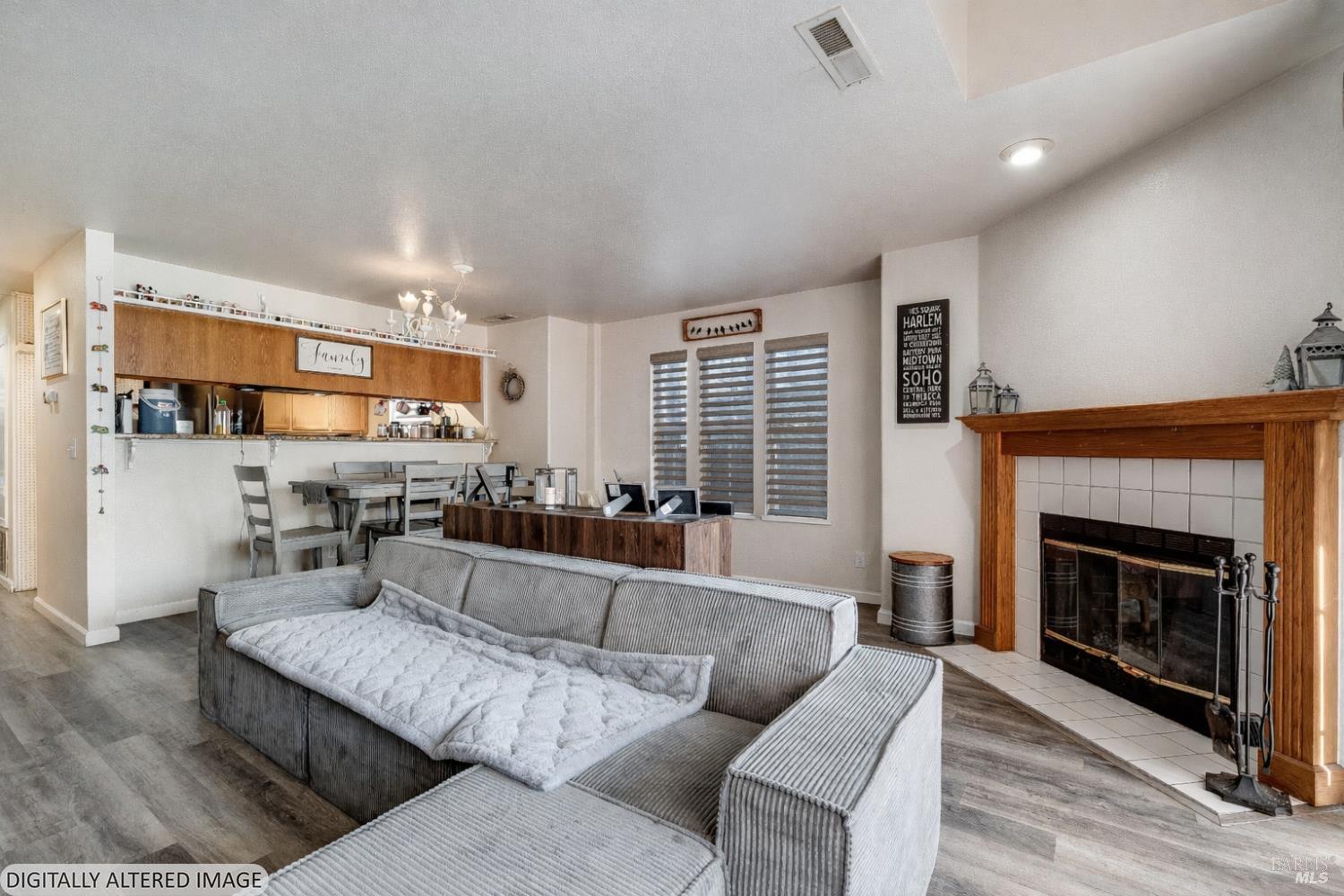 590 Laurel Grove Circle Santa Rosa, CA 95407 - Photo 6 of 44 a living room with furniture and a fireplace