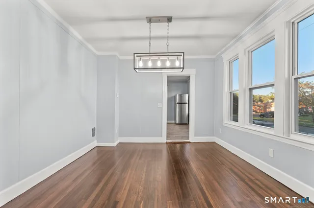 a view of livingroom with hardwood floor and window