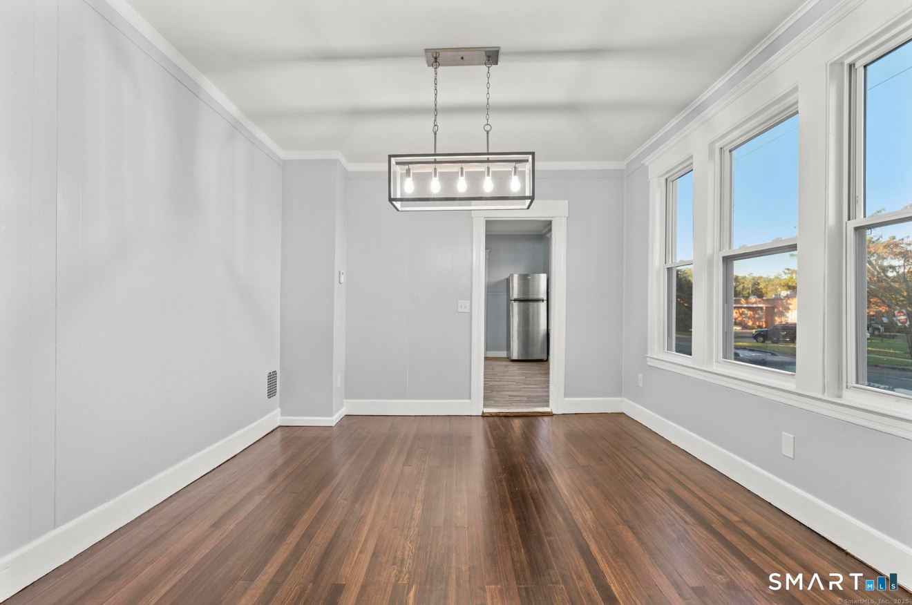 292 West Ivy Street New Haven, CT 06511 - Photo 6 of 16 a view of livingroom with hardwood floor and window