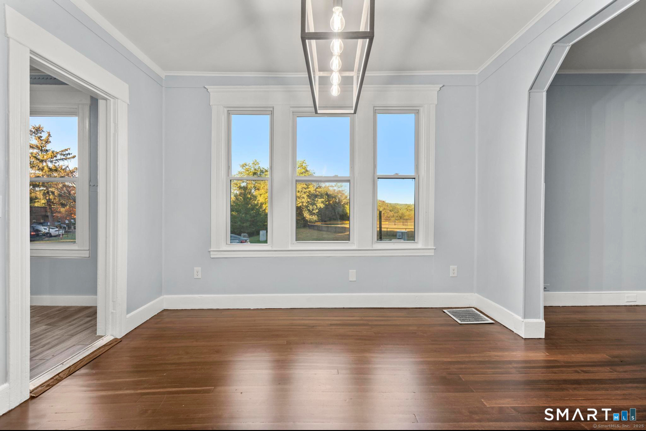 292 West Ivy Street New Haven, CT 06511 - Photo 7 of 16 a view of empty room with wooden floor and fan
